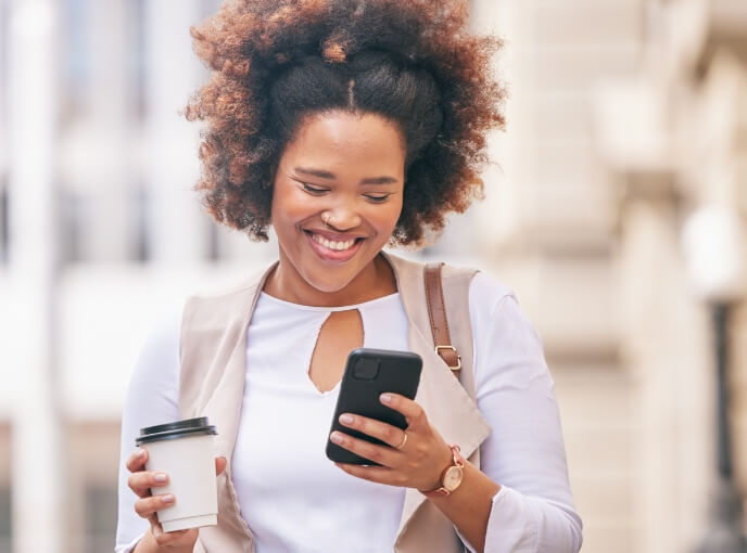 phone-coffee-and-business-woman-travel-and-walkin-2023-11-27-05-14-16-utc (1)
